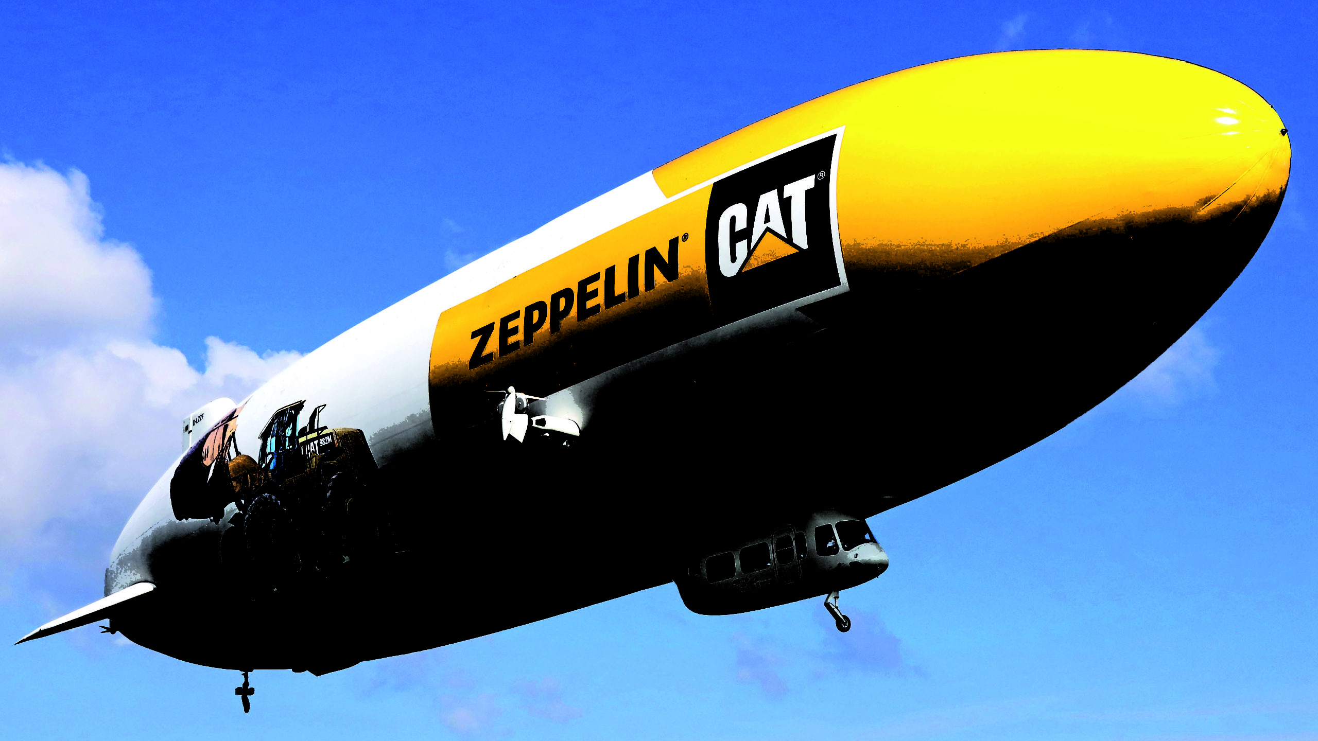 Den klassiska zeppelinaren med en Cat 982M-hjullastare och logotyp. Zeppelin GmbH ägs av stiftelsen Zeppelin-Stiftung samt Luftschiffbau Zeppelin GmbH. Stiftelsen grundades av Ferdinand von Zeppelin 1908.