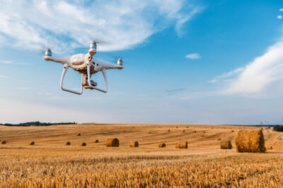 drone quad copter on yellow field